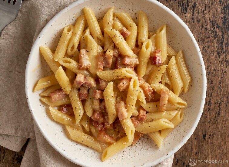 2021-08-23-a6s5mx-carbonara-pasta-penne-with-pancetta-egg-parmesan-c-tqsvz8z