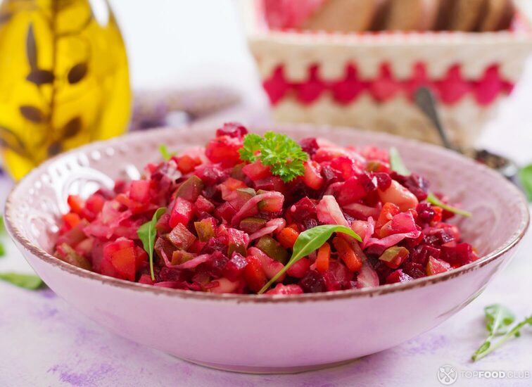 2021-08-25-5842zr-beet-salad-vinaigrette-in-a-pink-bowl-pyhqffl