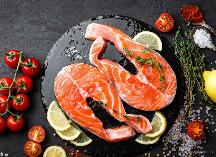 2021-09-02-3cbqwi-fresh-raw-salmon-red-fish-steaks-on-black-backgrou-pn8d8u5