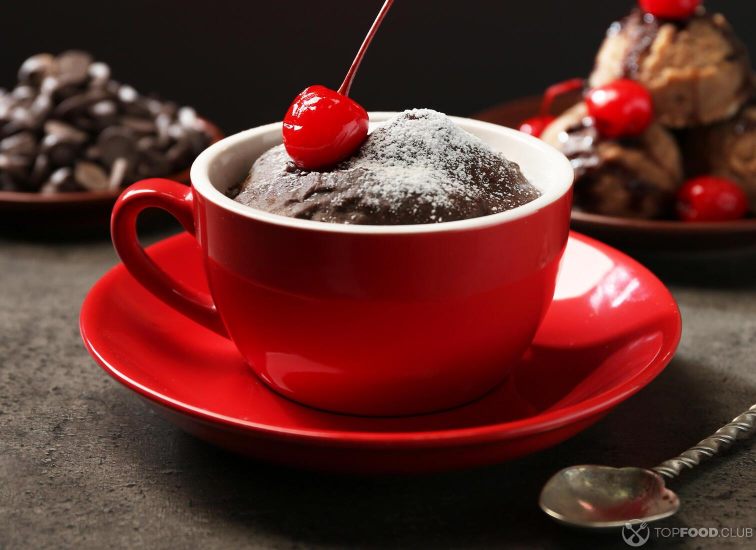 2021-09-13-3a4yfg-chocolate-cake-in-a-red-mug-with-a-cherry-on-top-close-up