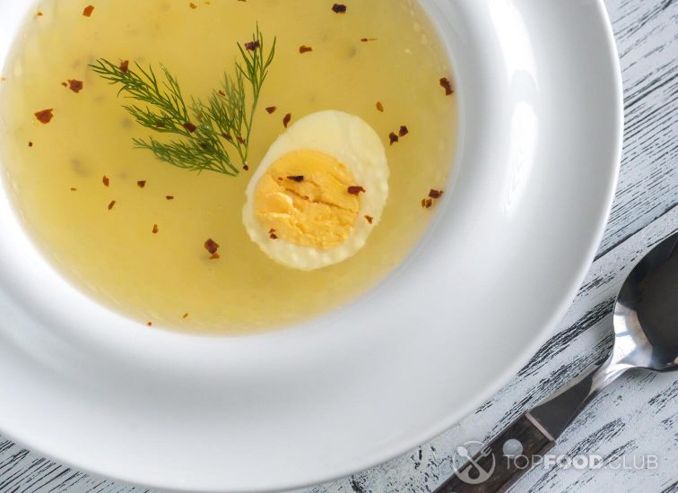 Chicken broth with rice and hard-boiled egg