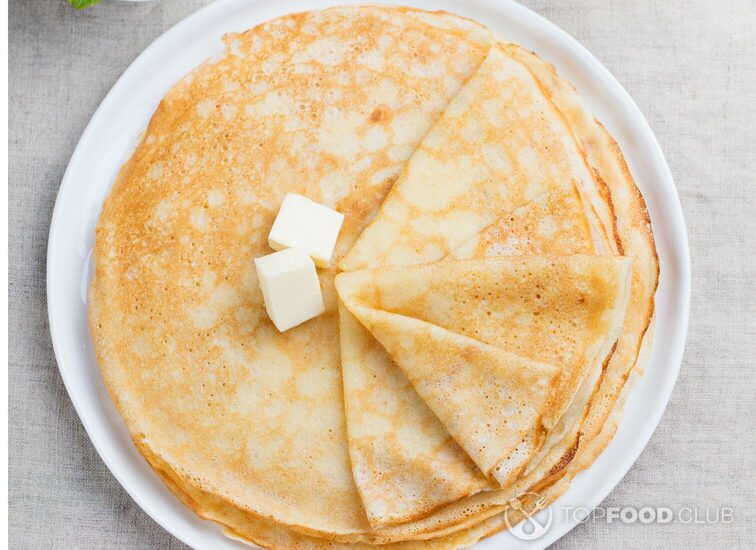 2021-10-11-t9g8rb-thin-crepes-or-pancakes-with-butter-and-sour-cream-p59gda5