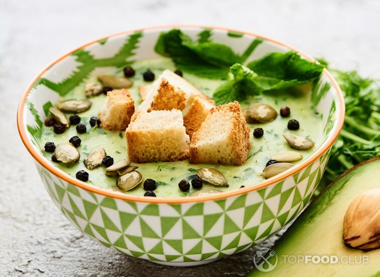 2021-11-23-p9b05l-bowl-of-delicious-green-creamy-soup-with-croutons-2021-09-03-07-40-34-utc