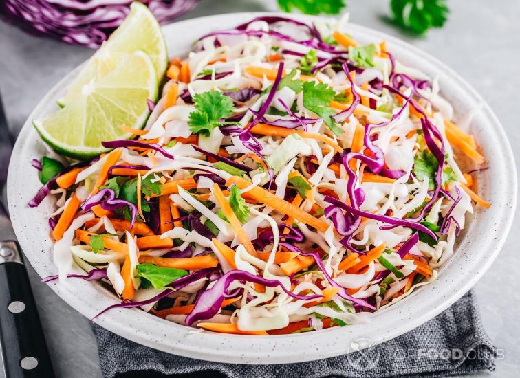2021-11-26-w1zo3t-cilantro-lime-coleslaw-salad-with-red-and-white-ca-9bhdas4