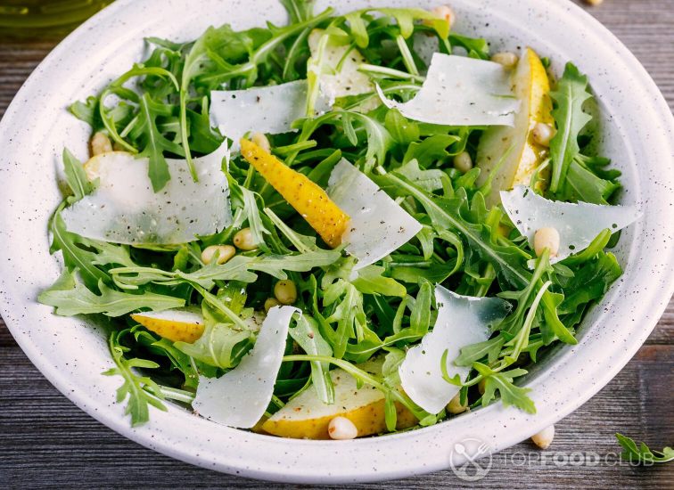 2021-12-08-p3t4sn-green-salad-bowl-of-arugula-with-pear-parmesan-che-pj9f28y