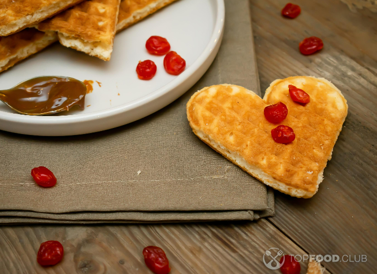 2023-01-29-uynq7o-homemade-belgian-waffles-heart-shaped-on-plate-wit-2022-11-01-08-33-18-utc