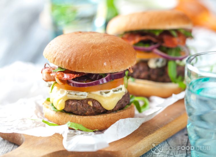 2023-03-14-xuf7pl-homemade-tasty-burgers-with-cheese-and-pesto-2021-08-26-20-26-55-utc