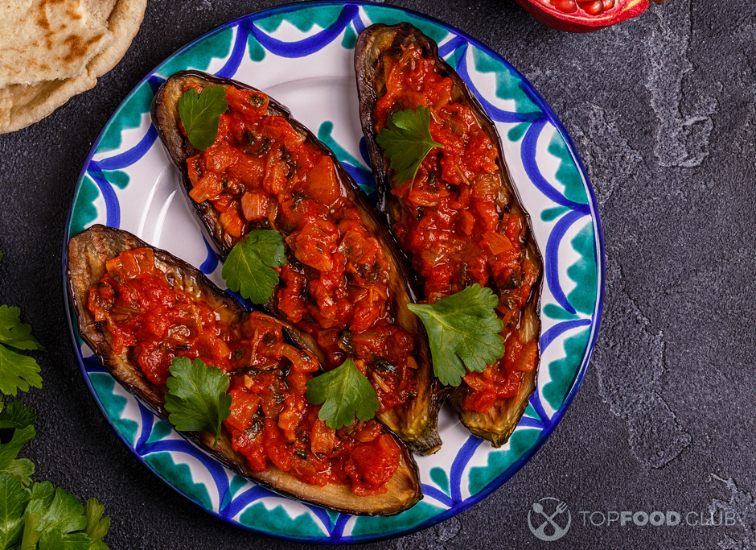 2023-08-10-e265x9-baked-eggplant-with-tomatoes-garlic