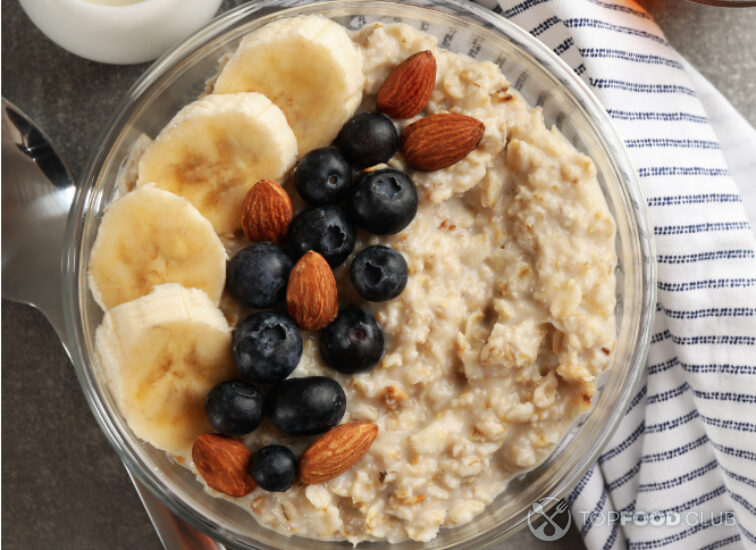 2023-09-28-1w9t2u-composition-with-oatmeal-porridge-with-fruits-on-g-2021-09-02-21-35-27-utc