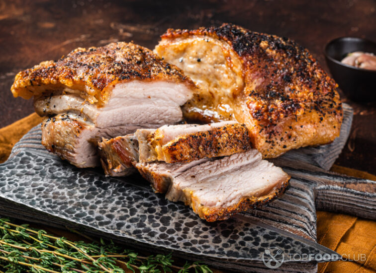 2023-11-24-mqcp56-roasted-pork-belly-bacon-with-crust-on-a-wooden-bo-2022-06-07-12-35-48-utc