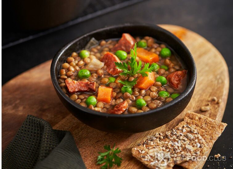 2021-09-27-62z8ws-traditional-spanish-dish-of-lentil-stew-with-chori-pkfkuz6