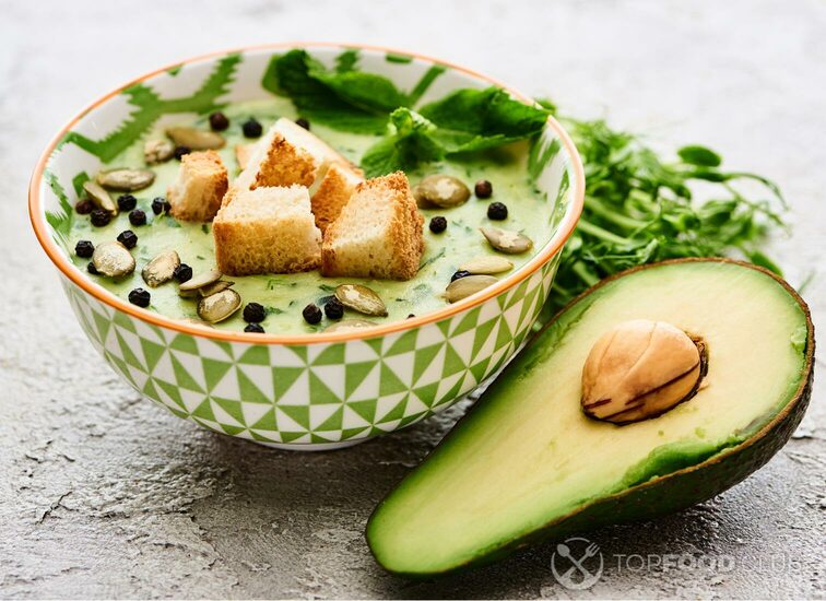 2021-09-28-89facp-bowl-of-delicious-green-creamy-soup-with-croutons-699g2hw