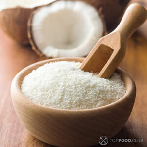 Всыпать кокосовую стружку.