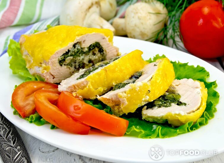 2021-10-21-wdv6sx-roll-chicken-with-mushrooms-on-salad-in-plate-2021-08-30-18-58-00-utc