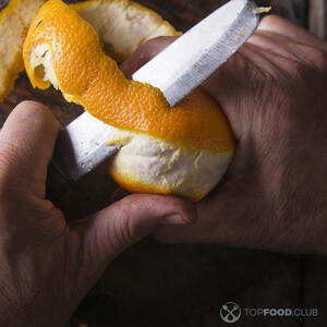 Чистить апельсин