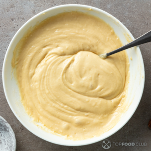 Перемешать тесто для оладий