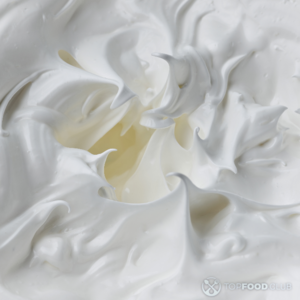 Добавить взбитые белки