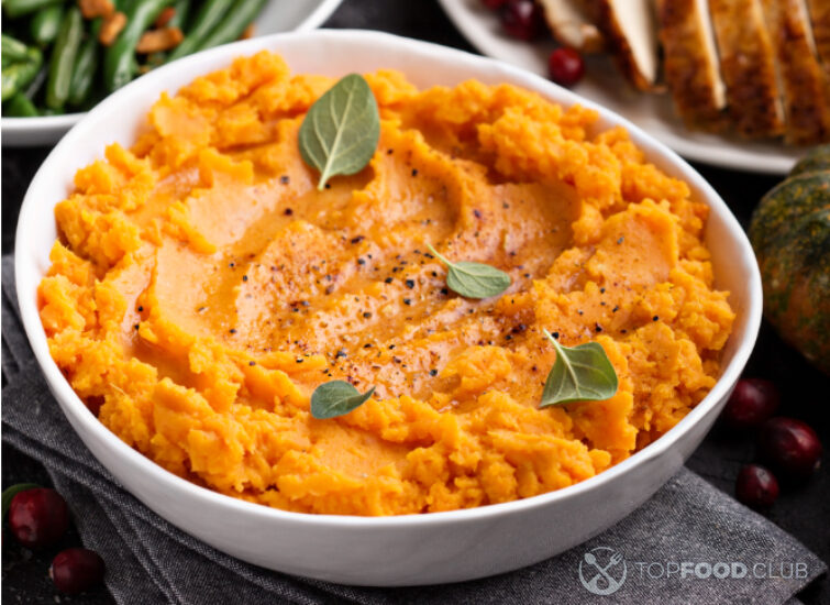 2024-01-04-dib1ky-mashed-sweet-potatoes-on-thanksgiving-table-2023-11-27-05-17-44-utc