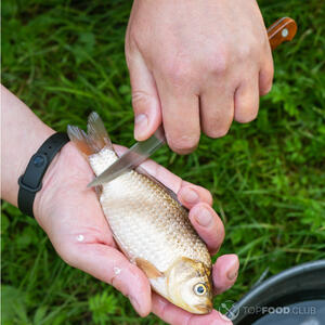 Очистить карася