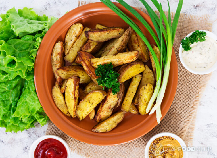 2025-01-21-zu37v2-baked-potato-wedges-with-spices-top-view-2023-11-27-05-01-37-utc