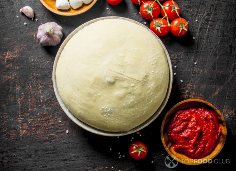 2025-05-29-3p8t7k-raw-pizza-dough-with-tomato-paste-mozzarella-and-2024-09-18-01-01-57-utc