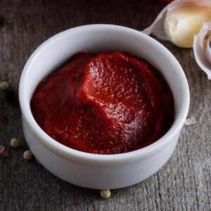 Add tomato paste to soup