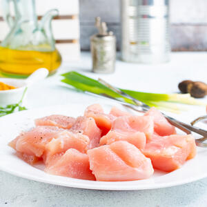 Cut the chicken breasts into chunks.