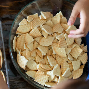 Grind the cookies into crumbs.