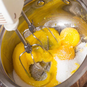 Beat eggs and sugar.