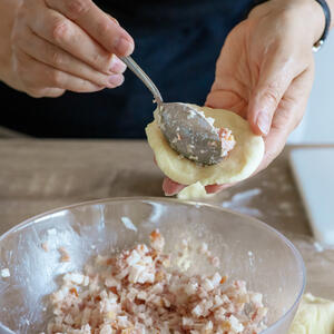 Putting the filling.