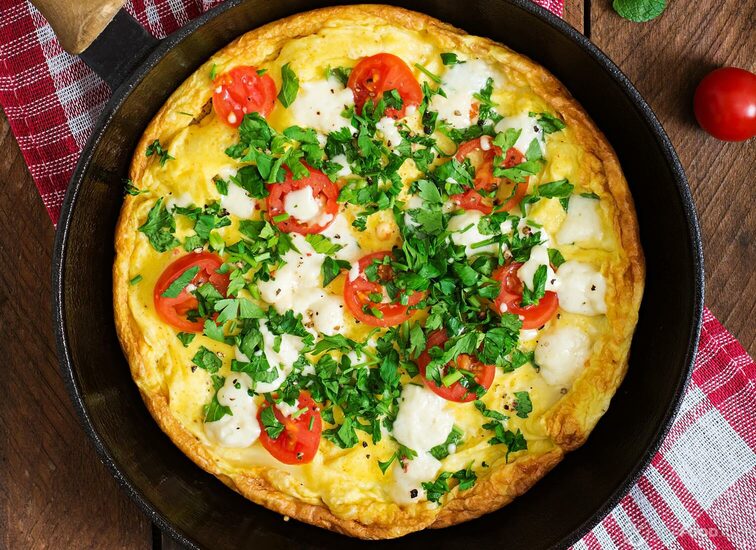 2021-08-23-ao1t39-omelet-with-tomatoes-parsley-and-feta-cheese-in-p-2021-04-03-03-59-06-utc