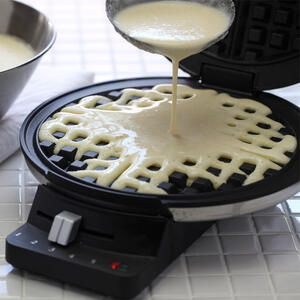 Heat the waffle iron.