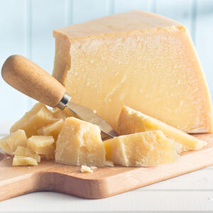 Cut hard cheese into cubes.