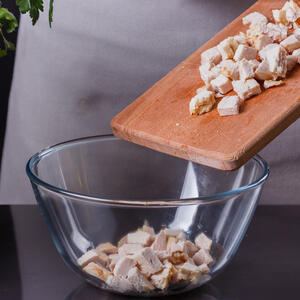 Then remove chicken from the water, cut into small chunks. 