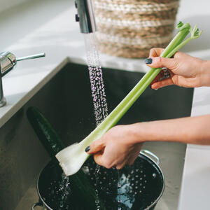 Rinse the celery under running water