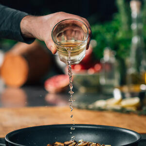 Pour wine into a pan