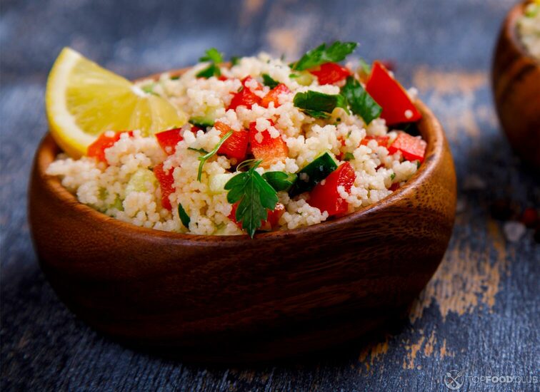 2021-08-26-5qi08z-tabbouleh-salad-with-couscous-on-the-plate-traditi-sss5pnp