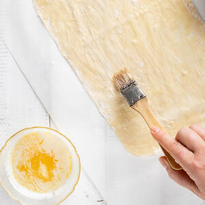 To grease the dough.