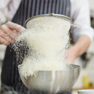 Sift the flour with the remaining of powdered sugar in a separate bowl. 
