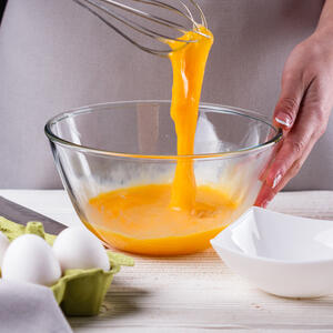 Break eggs and beat them