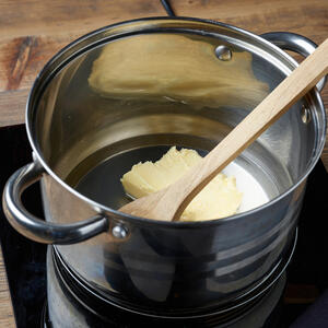Melt butter in a pot or in a microwave.