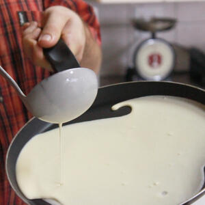 Pour the batter into the pan, use a ladle