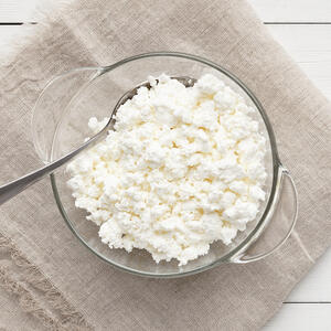 Then add cottage cheese and milk. Beat the mixture until smooth.