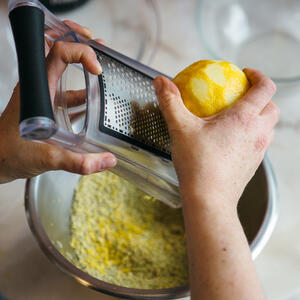 Rinse lemon, grate the lemon zest.