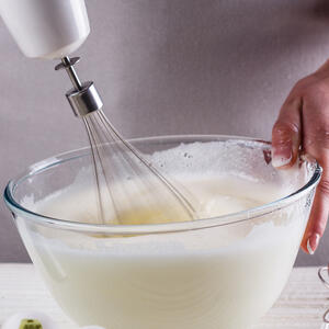 Beat the egg whites with a mixer on a low speed until stiff for about 10 minutes.
