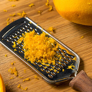 Rub the orange zest into the sugar.