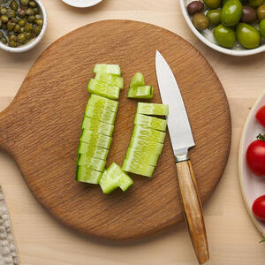 To cut the cucumbers.