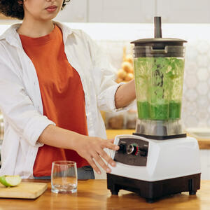 Add all ingredients to a blender.