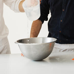 In a medium bowl, beat the chickpea flour.