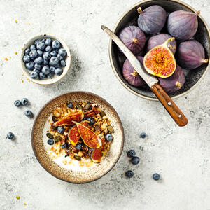 Top with the seeds, nuts, coconut, and granola.